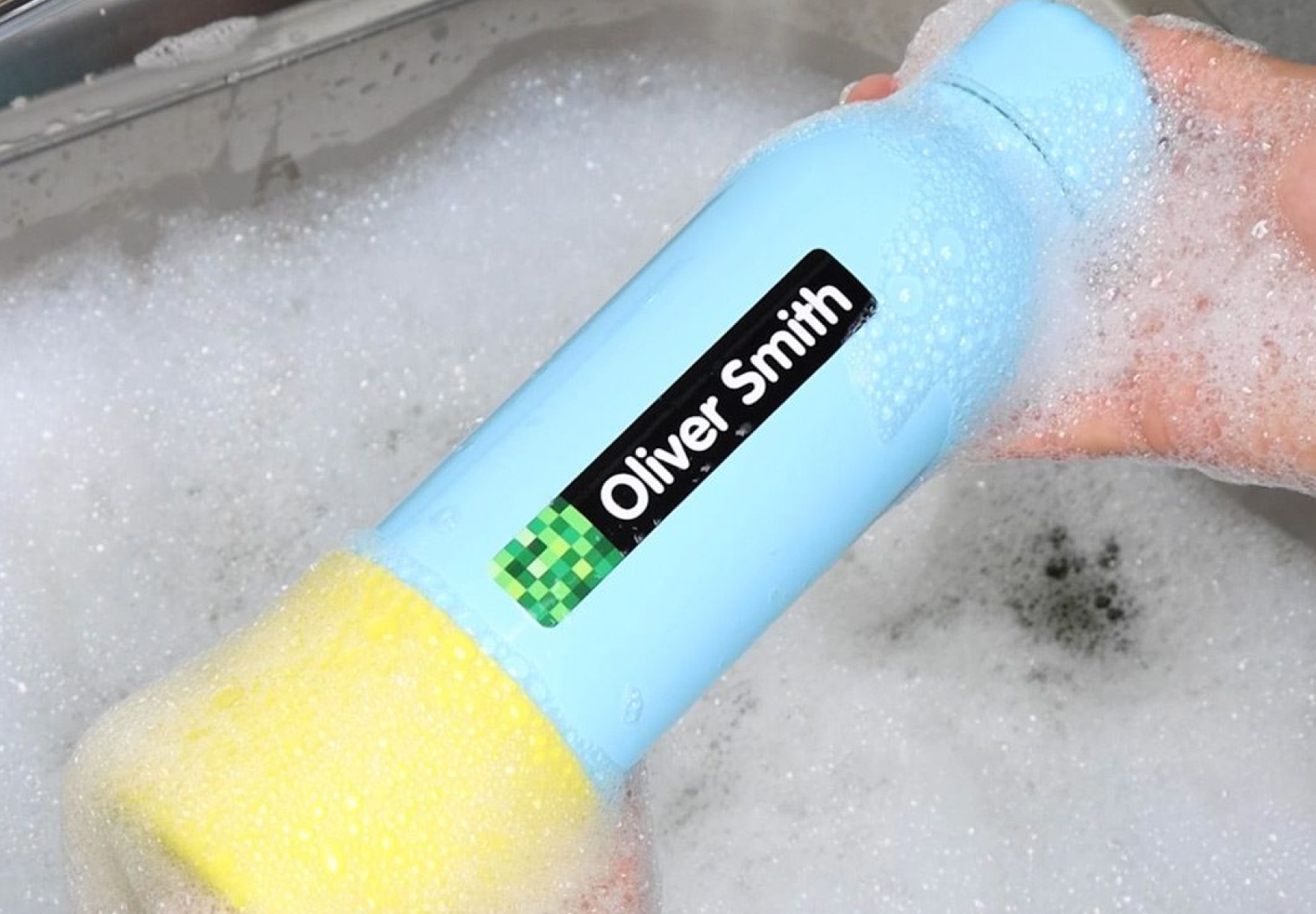 Waterproof name label still intact on a drink bottle after washing